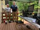 W4AWM (left)  Chief of Dun Loring (VA) Fire and Rescue Department (right) showing W4AWM Field Day station. Two Drake TR-7s,one is a spare.